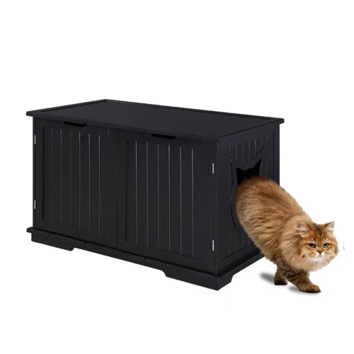 Black pet crate with a cat peeking out on a white background